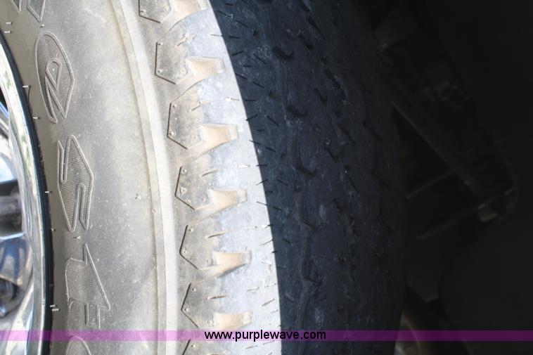 image for item B6664 2002 Dodge Ram 1500 quad cab pickup truck