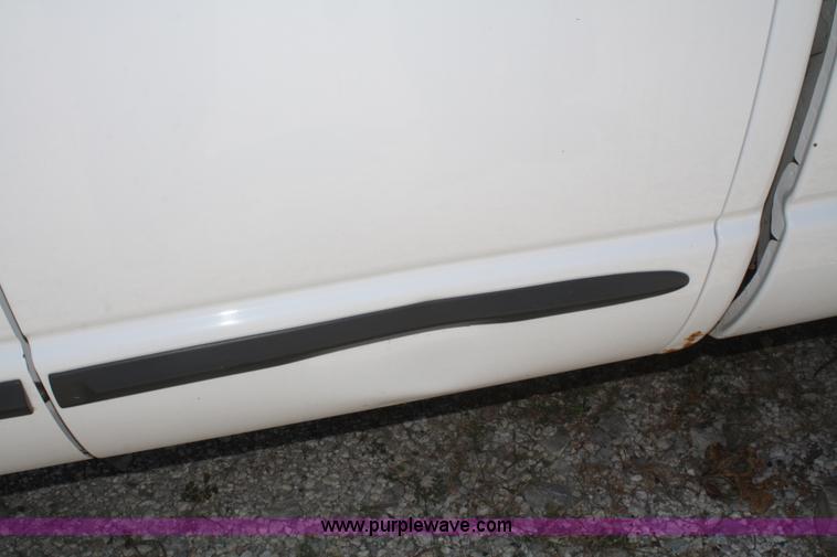 image for item B6664 2002 Dodge Ram 1500 quad cab pickup truck