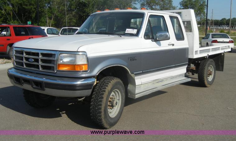 image for item D4243 1997 Ford F250 Heavy Duty flatbed pickup truck