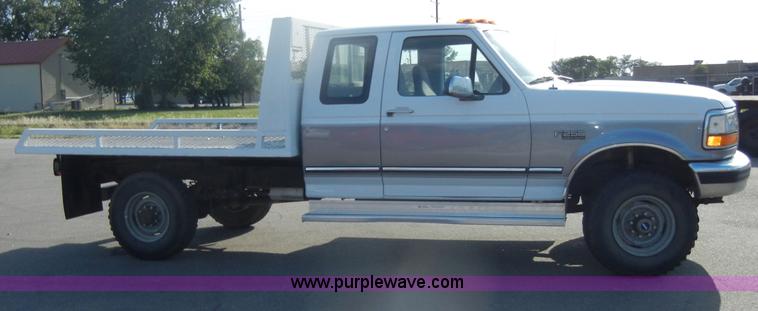 image for item D4243 1997 Ford F250 Heavy Duty flatbed pickup truck