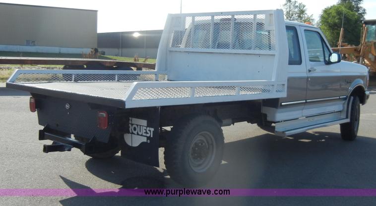 image for item D4243 1997 Ford F250 Heavy Duty flatbed pickup truck
