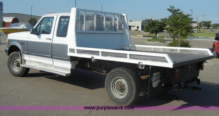 image for item D4243 1997 Ford F250 Heavy Duty flatbed pickup truck
