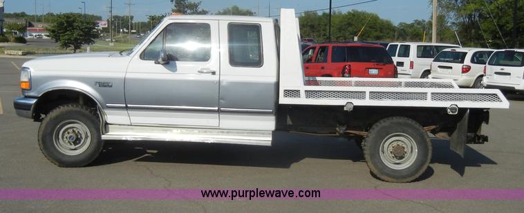 image for item D4243 1997 Ford F250 Heavy Duty flatbed pickup truck