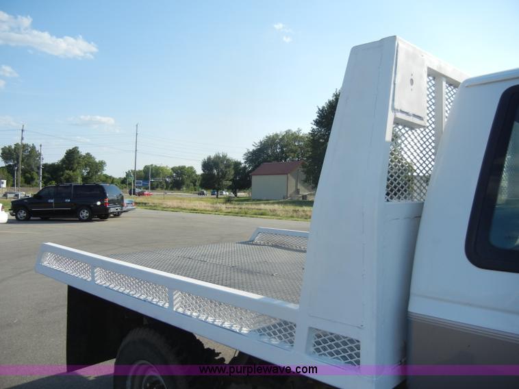 image for item D4243 1997 Ford F250 Heavy Duty flatbed pickup truck