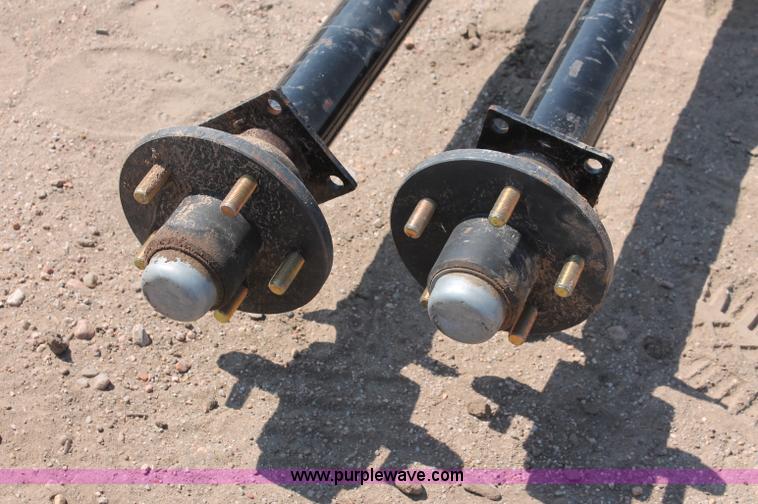 image for item L9921 (2) Rockwell American 3,500 lbs trailer axles