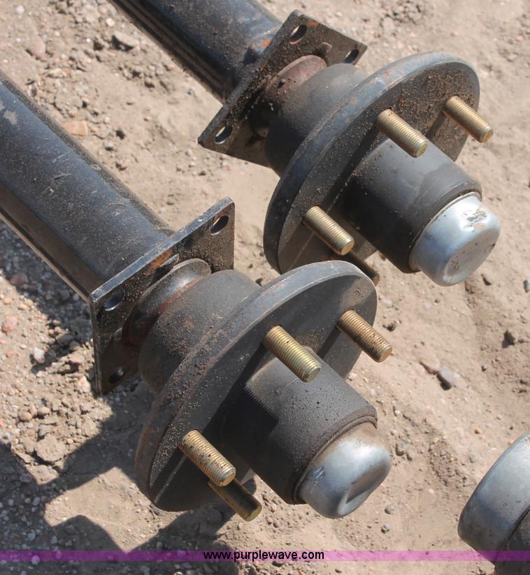 image for item L9921 (2) Rockwell American 3,500 lbs trailer axles