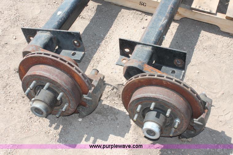 image for item L9923 (2) Con-Way 7,500 lbs torture axles with brakes