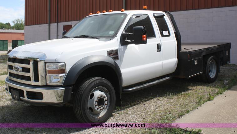 image for item B6537 2008 Ford F450 XLT flatbed pickup truck