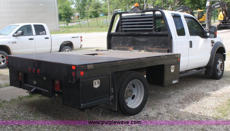 image for item B6537 2008 Ford F450 XLT flatbed pickup truck