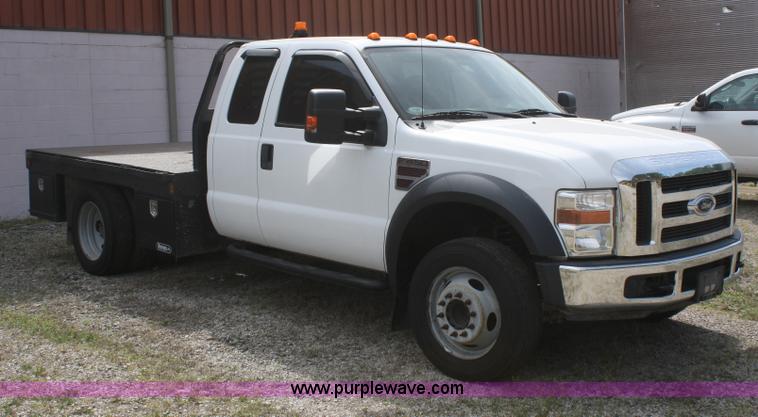 image for item B6537 2008 Ford F450 XLT flatbed pickup truck