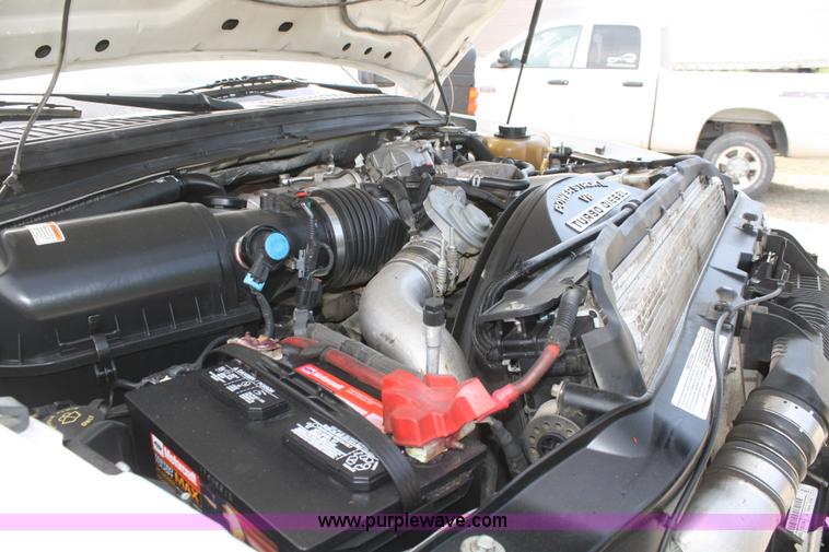 image for item B6537 2008 Ford F450 XLT flatbed pickup truck