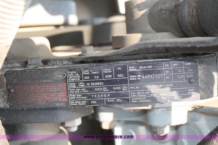 image for item B6673 1994 Ford F700 dump truck