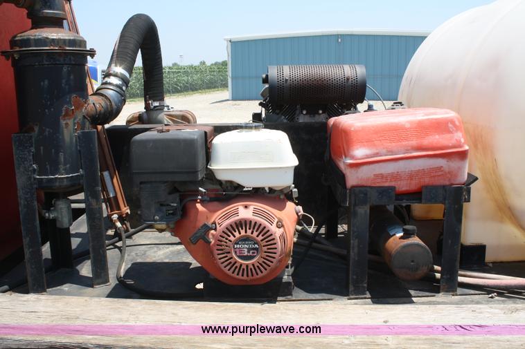 image for item B6676 2000 Rockin L trailer with 1,000 gallon Max Vac unit