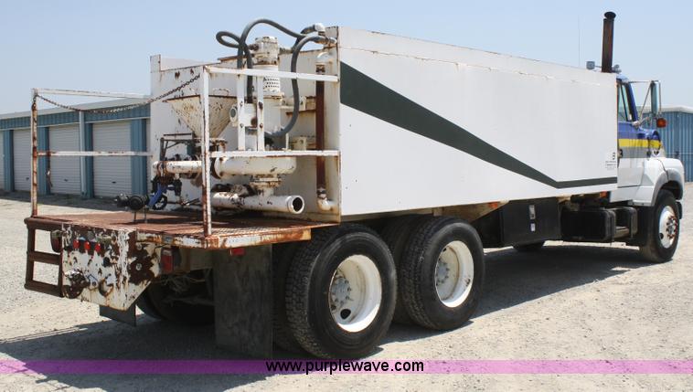 image for item B6677 1991 Ford L9000 AeroMax semi truck with basic fabrication and equipment mud system