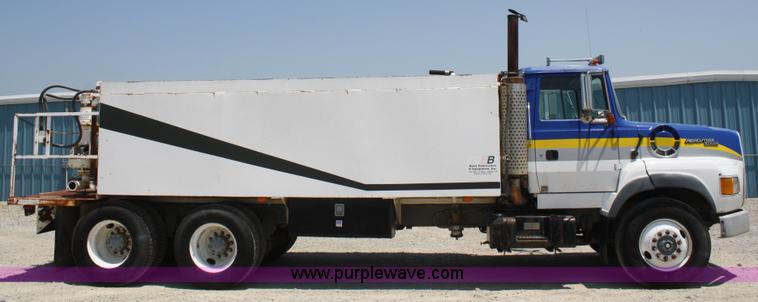 image for item B6677 1991 Ford L9000 AeroMax semi truck with basic fabrication and equipment mud system