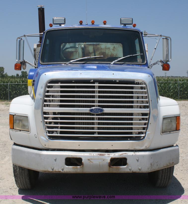image for item B6677 1991 Ford L9000 AeroMax semi truck with basic fabrication and equipment mud system