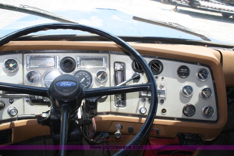 image for item B6677 1991 Ford L9000 AeroMax semi truck with basic fabrication and equipment mud system