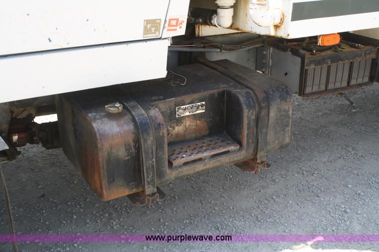 image for item B6677 1991 Ford L9000 AeroMax semi truck with basic fabrication and equipment mud system