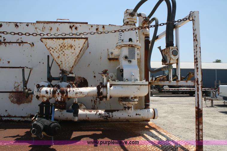 image for item B6677 1991 Ford L9000 AeroMax semi truck with basic fabrication and equipment mud system