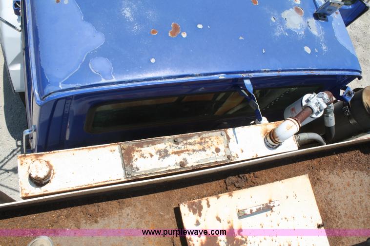 image for item B6677 1991 Ford L9000 AeroMax semi truck with basic fabrication and equipment mud system