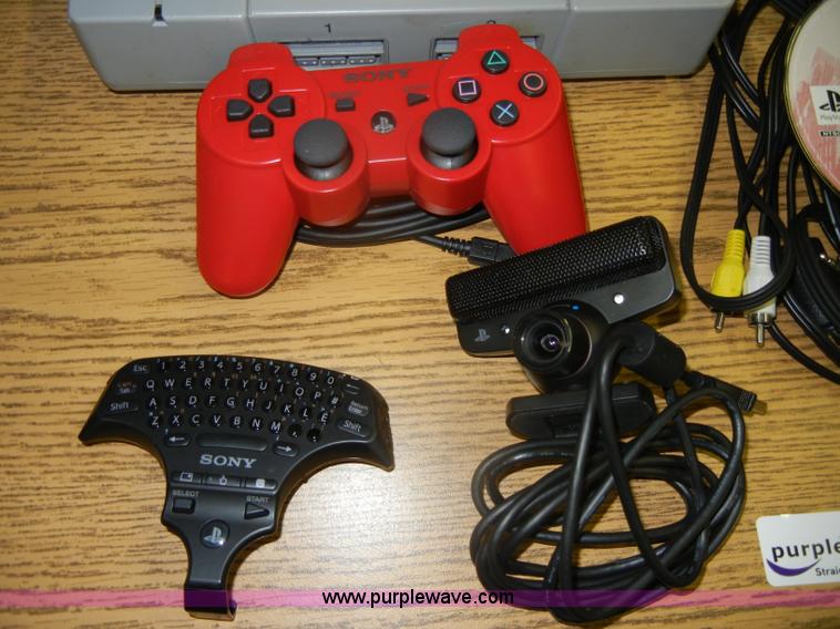 image for item N9908 PlayStation game console with accessories