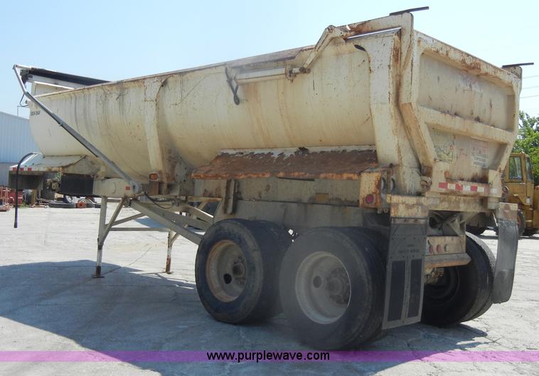 image for item D4182 2004 Ranch Ranco 24' barrel end dump trailer