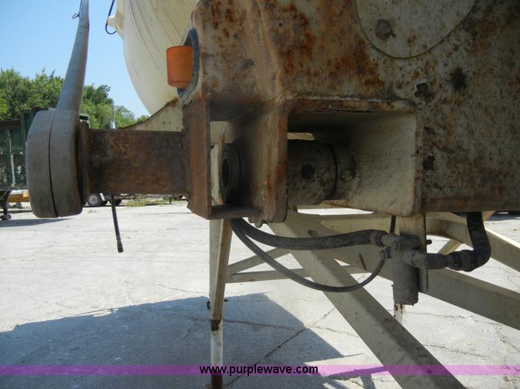 image for item D4182 2004 Ranch Ranco 24' barrel end dump trailer