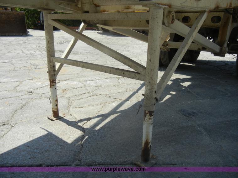 image for item D4182 2004 Ranch Ranco 24' barrel end dump trailer