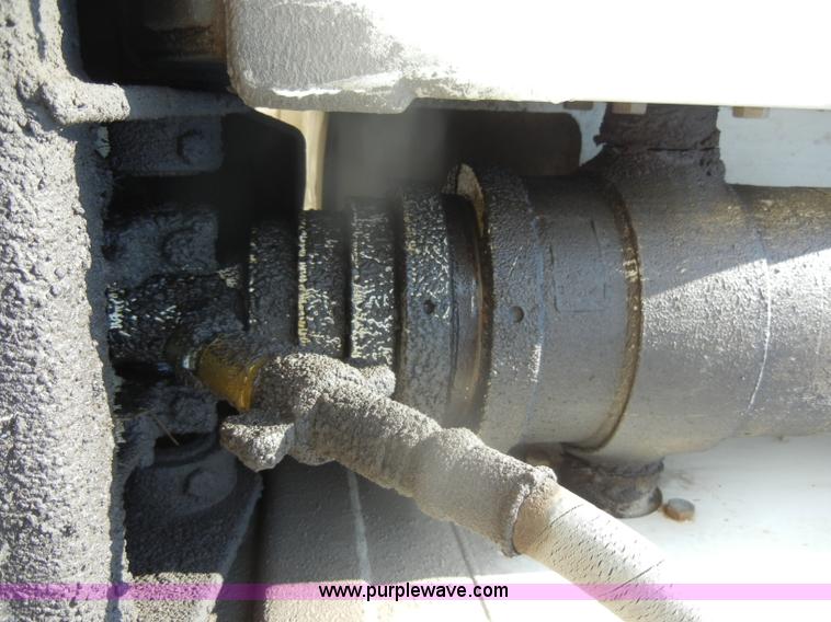 image for item D4182 2004 Ranch Ranco 24' barrel end dump trailer