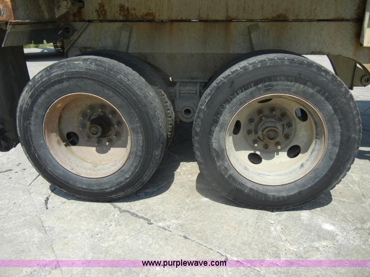 image for item D4182 2004 Ranch Ranco 24' barrel end dump trailer