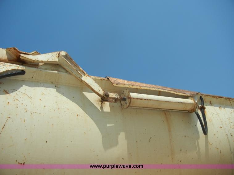 image for item D4182 2004 Ranch Ranco 24' barrel end dump trailer