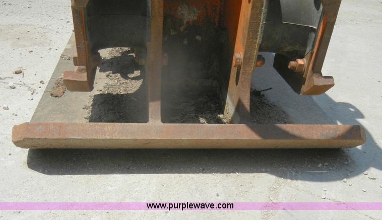 image for item D4184 NPK C8C hydraulic excavator ground compactor