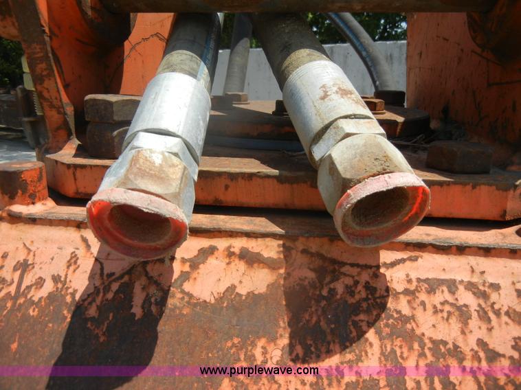 image for item D4184 NPK C8C hydraulic excavator ground compactor