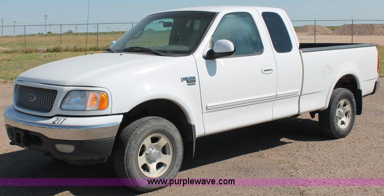 image for item C2696 1999 Ford F150 XLT extended cab pickup truck