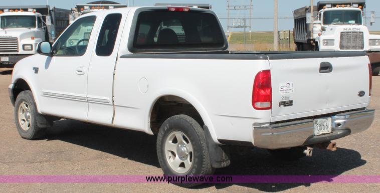 image for item C2696 1999 Ford F150 XLT extended cab pickup truck