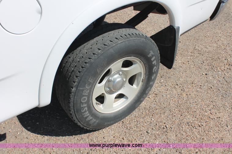 image for item C2696 1999 Ford F150 XLT extended cab pickup truck