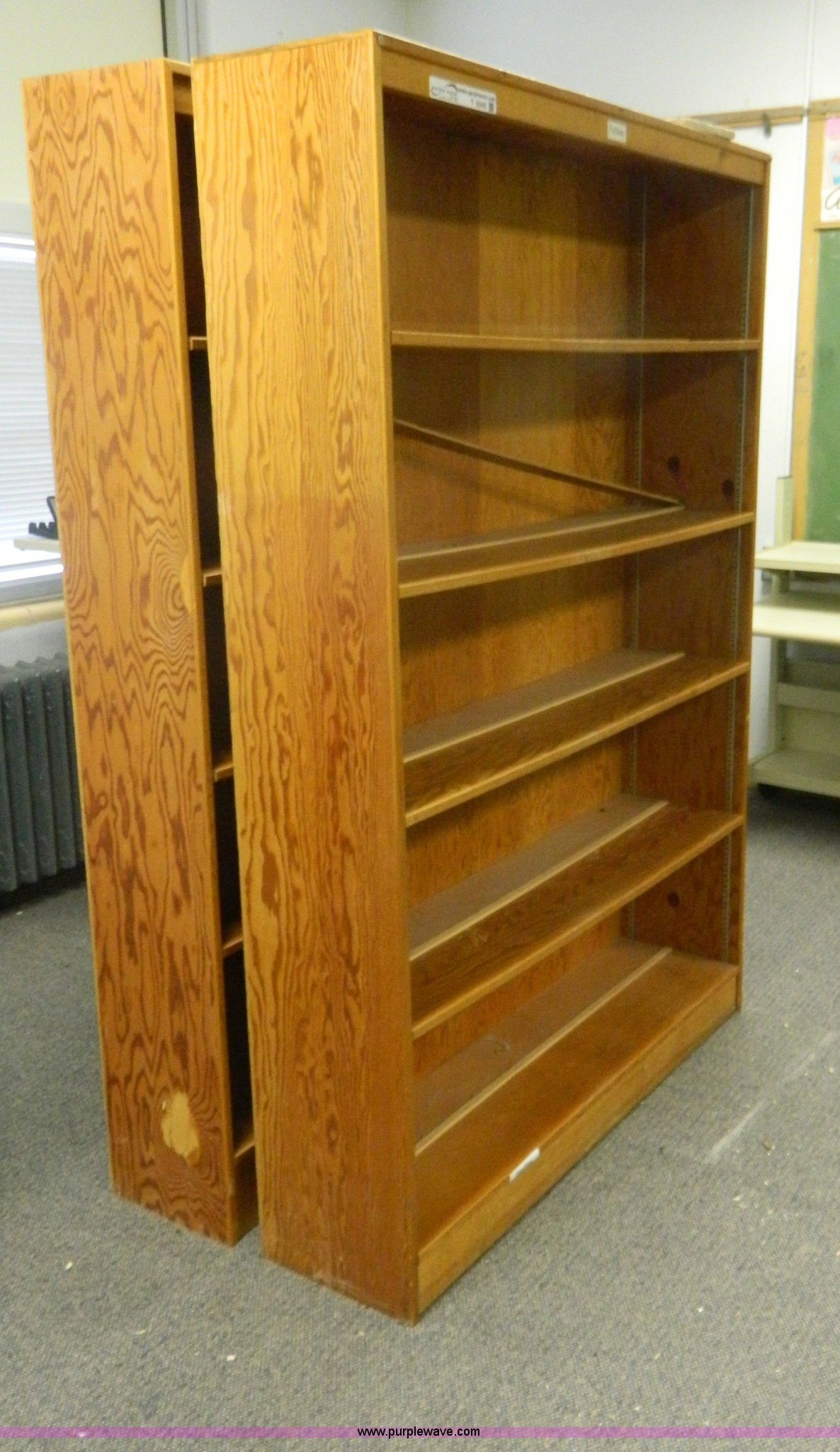 (2) wood shelf units in Claflin, KS Item T9340 sold Purple Wave