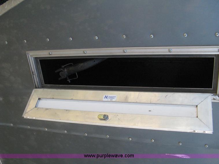 image for item A6491 2005 Continental Cargo tandem axle gooseneck cargo trailer