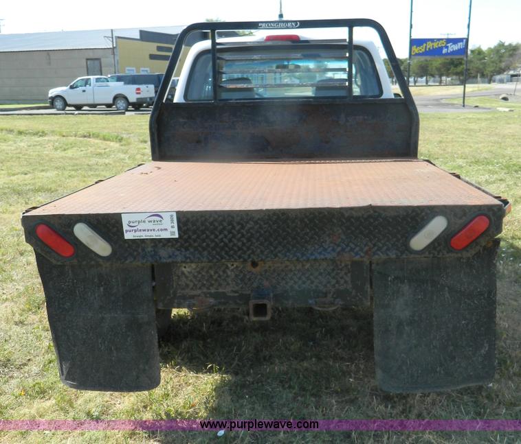 image for item B3806 2001 Toyota Tacoma flatbed pickup truck