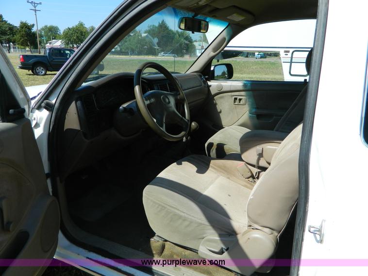 image for item B3806 2001 Toyota Tacoma flatbed pickup truck