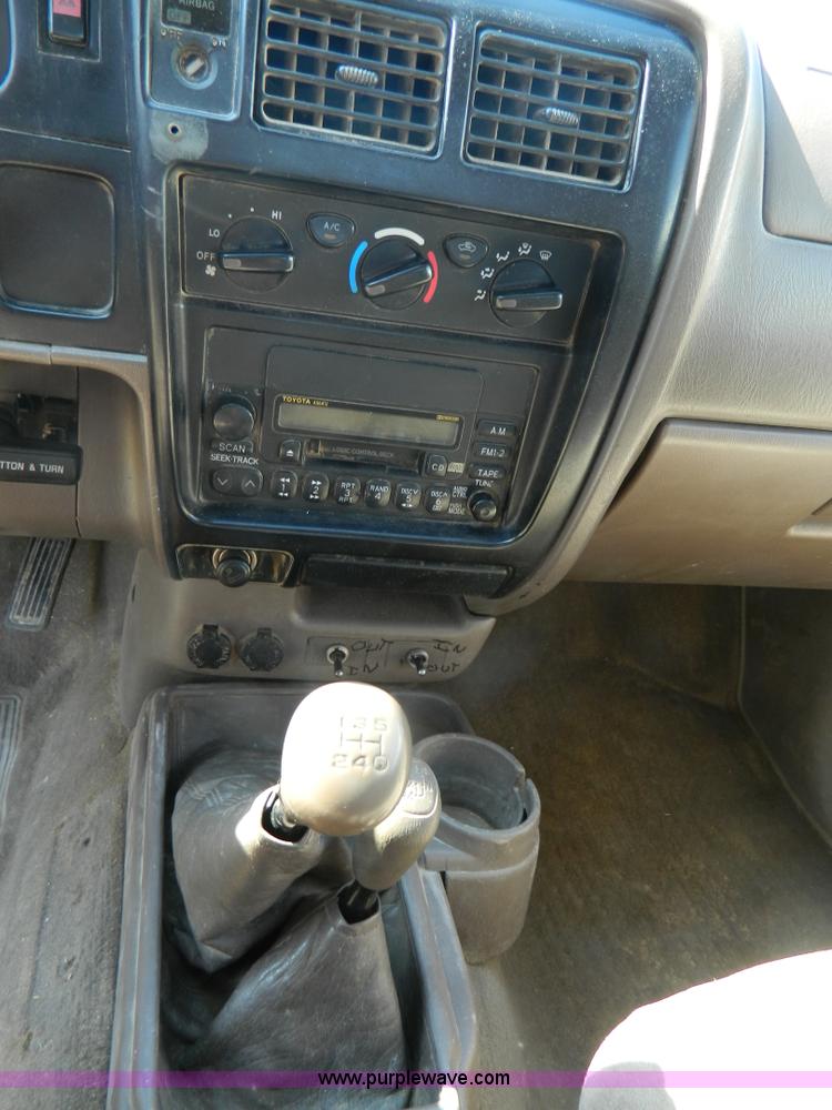 image for item B3806 2001 Toyota Tacoma flatbed pickup truck