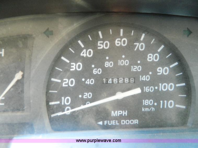 image for item B3806 2001 Toyota Tacoma flatbed pickup truck