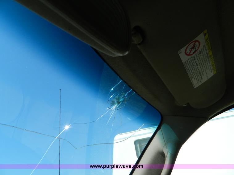 image for item B3806 2001 Toyota Tacoma flatbed pickup truck