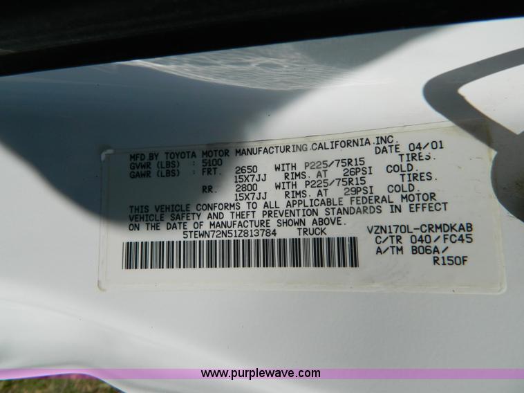 image for item B3806 2001 Toyota Tacoma flatbed pickup truck