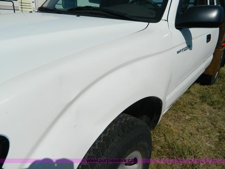image for item B3806 2001 Toyota Tacoma flatbed pickup truck