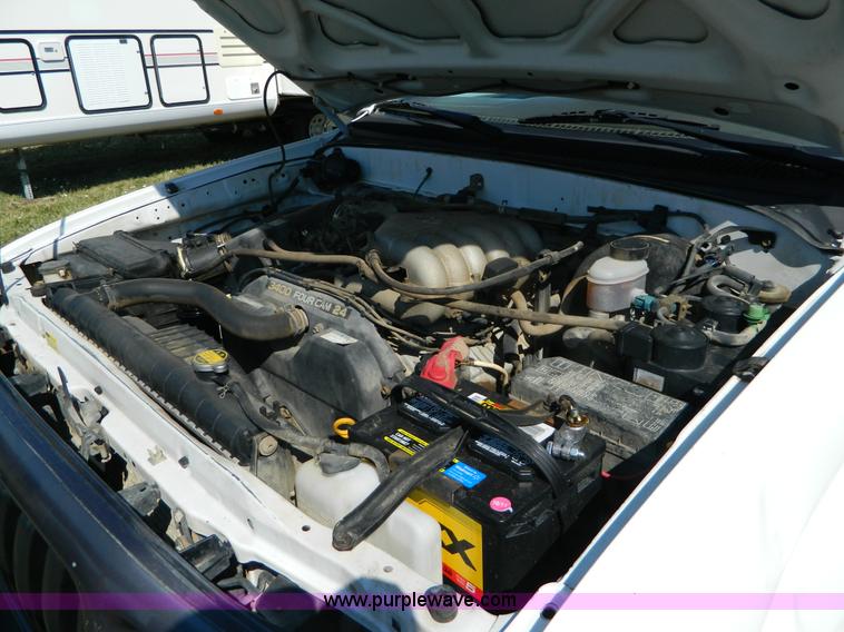 image for item B3806 2001 Toyota Tacoma flatbed pickup truck