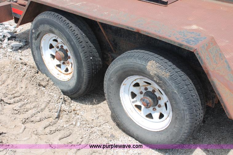 image for item C2605 2000 Roadhog Uniloader tandem axle trailer