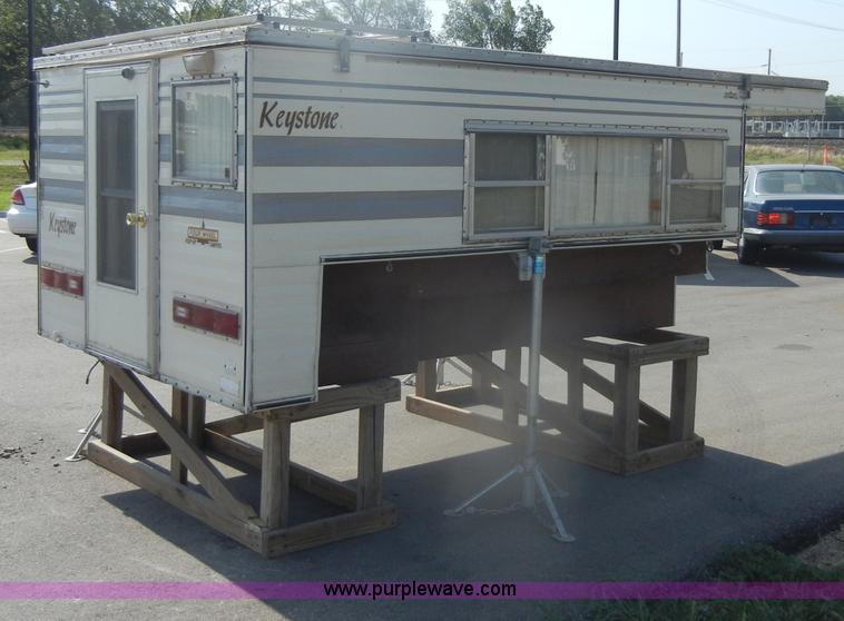image for item D4362 1983 Keystone four wheel pop-up truck camper