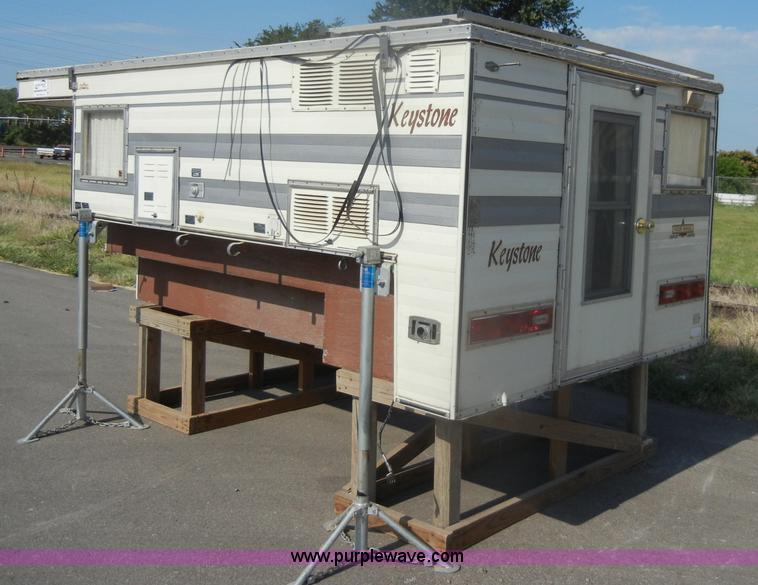 image for item D4362 1983 Keystone four wheel pop-up truck camper