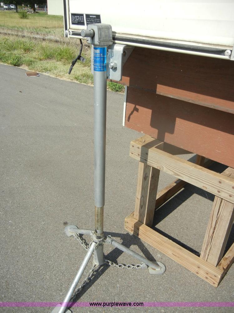 image for item D4362 1983 Keystone four wheel pop-up truck camper